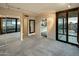 Primary bedroom with mirrored closet and access to a balcony at 4808 N 24Th St # 627, Phoenix, AZ 85016