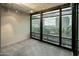 Spacious bedroom with floor-to-ceiling windows offering city views at 4808 N 24Th St # 627, Phoenix, AZ 85016