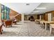 Spacious common area with comfortable seating and large tables at 4808 N 24Th St # 627, Phoenix, AZ 85016