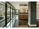 Hallway with sleek floors and access to kitchen and living spaces at 4808 N 24Th St # 627, Phoenix, AZ 85016