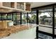 Modern kitchen with granite counters and access to patio at 4808 N 24Th St # 627, Phoenix, AZ 85016