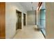Modern building lobby with elevators and seating area at 4808 N 24Th St # 627, Phoenix, AZ 85016