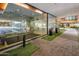 Modern condo lobby with seating and large windows to courtyard at 4808 N 24Th St # 627, Phoenix, AZ 85016