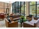 Comfortable lounge with modern furniture and large windows at 4808 N 24Th St # 627, Phoenix, AZ 85016