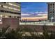 View of a parking garage from a high-rise condo with city views at 4808 N 24Th St # 627, Phoenix, AZ 85016