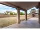 Covered patio overlooks a grassy backyard at 524 N Leoma Ln, Chandler, AZ 85225