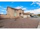 Two-story house with beige exterior, two-car garage, and rock landscaping at 524 N Leoma Ln, Chandler, AZ 85225