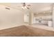 Bright kitchen with white cabinets, tile flooring, and stainless steel appliances at 524 N Leoma Ln, Chandler, AZ 85225