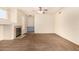 Living room with fireplace, built-in cabinetry, and carpeting at 524 N Leoma Ln, Chandler, AZ 85225