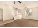 Spacious living room with high ceilings, carpeting, and ceiling fans at 524 N Leoma Ln, Chandler, AZ 85225