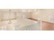 Open loft area with high ceilings and two windows with blinds at 524 N Leoma Ln, Chandler, AZ 85225
