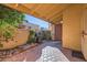 Outdoor patio area with grill and landscaping at 6900 E Gold Dust Ave # 126, Paradise Valley, AZ 85253