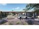 Relaxing backyard oasis with pool and lounge chairs at 7034 E Paradise Dr, Scottsdale, AZ 85254