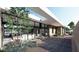 Modern courtyard with patio, landscaping, and view of interior living space at 7034 E Paradise Dr, Scottsdale, AZ 85254