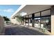Modern courtyard with stone patio and access to living room at 7034 E Paradise Dr, Scottsdale, AZ 85254