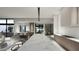 Modern kitchen with marble countertops and island at 7034 E Paradise Dr, Scottsdale, AZ 85254