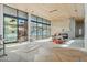 Bright living area with high ceilings and large windows, currently under construction at 7034 E Paradise Dr, Scottsdale, AZ 85254