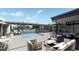 Inviting pool area with lounge chairs and outdoor seating at 7034 E Paradise Dr, Scottsdale, AZ 85254