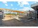 Under construction, pool area with wooden pergola at 7034 E Paradise Dr, Scottsdale, AZ 85254
