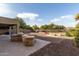 Backyard with built-in BBQ and fire pit at 7720 S 72Nd Ave, Laveen, AZ 85339