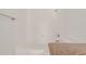 Clean bathroom with shower/tub combo and granite vanity at 812 E Joan De Arc Ave, Phoenix, AZ 85022