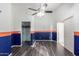 Bedroom with glass shower and wood flooring at 8630 W Melinda Ln, Peoria, AZ 85382