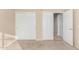 Bedroom with double door closet and carpet flooring at 8630 W Melinda Ln, Peoria, AZ 85382