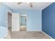Bedroom with mirrored closet doors and carpet flooring at 8630 W Melinda Ln, Peoria, AZ 85382