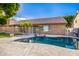 Sparkling pool with a large patio and basketball court at 8630 W Melinda Ln, Peoria, AZ 85382