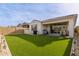 Artificial turf, covered patio, and a spacious backyard at 9658 E Tahoe Cir, Mesa, AZ 85212