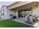 Covered patio, artificial turf, and a nice backyard at 9658 E Tahoe Cir, Mesa, AZ 85212
