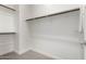 Walk-in closet with ample storage and organizational features, perfect for any wardrobe at 9658 E Tahoe Cir, Mesa, AZ 85212