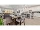 Open concept kitchen and dining area with large island at 9658 E Tahoe Cir, Mesa, AZ 85212