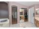 Main bathroom features a large walk-in closet and double sinks at 970 N Portland Ave, Gilbert, AZ 85234