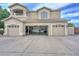 Three-car garage with interior storage space at 970 N Portland Ave, Gilbert, AZ 85234