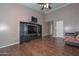 Living room with wood floors and built-in entertainment center at 970 N Portland Ave, Gilbert, AZ 85234