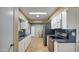 Bright kitchen with granite countertops and stainless steel appliances at 9909 W Newport Dr, Sun City, AZ 85351