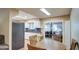 Kitchen features dark countertops and a breakfast nook at 9909 W Newport Dr, Sun City, AZ 85351