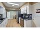 Kitchen features granite countertops and modern appliances at 9909 W Newport Dr, Sun City, AZ 85351