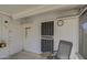 Bright sunroom with exterior access and additional seating at 9909 W Newport Dr, Sun City, AZ 85351