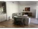 Spacious living room with comfortable seating and hardwood floors at 9992 E Carol Ave, Scottsdale, AZ 85258