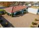 Aerial view of a single-story home with a red tile roof and a large backyard at 1001 N Burk St, Gilbert, AZ 85234