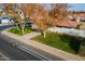 Aerial view of a single story home with a red tile roof and a well-maintained lawn at 1001 N Burk St, Gilbert, AZ 85234