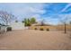 Large backyard with gravel and a block wall at 1001 N Burk St, Gilbert, AZ 85234