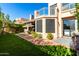 Private backyard oasis with patio furniture and artificial turf at 10069 E Turquoise Ave, Scottsdale, AZ 85258