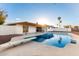 Inviting backyard with a sparkling pool and diving board at 1164 E Westchester Dr, Tempe, AZ 85283