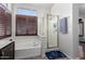 Bathroom with soaking tub, shower, and double sink vanity at 1269 N Layman St, Gilbert, AZ 85233