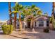 Front view of a two-story home with lush landscaping at 1269 N Layman St, Gilbert, AZ 85233