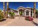 Single-story home with desert landscaping and walkway at 1269 N Layman St, Gilbert, AZ 85233