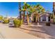 Two-story home with palm trees and stone pathway at 1269 N Layman St, Gilbert, AZ 85233